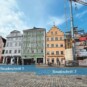 Häuserfront der Unteren Altstadt in Landshut mit Visualisierung der beiden Bauabschnitte.